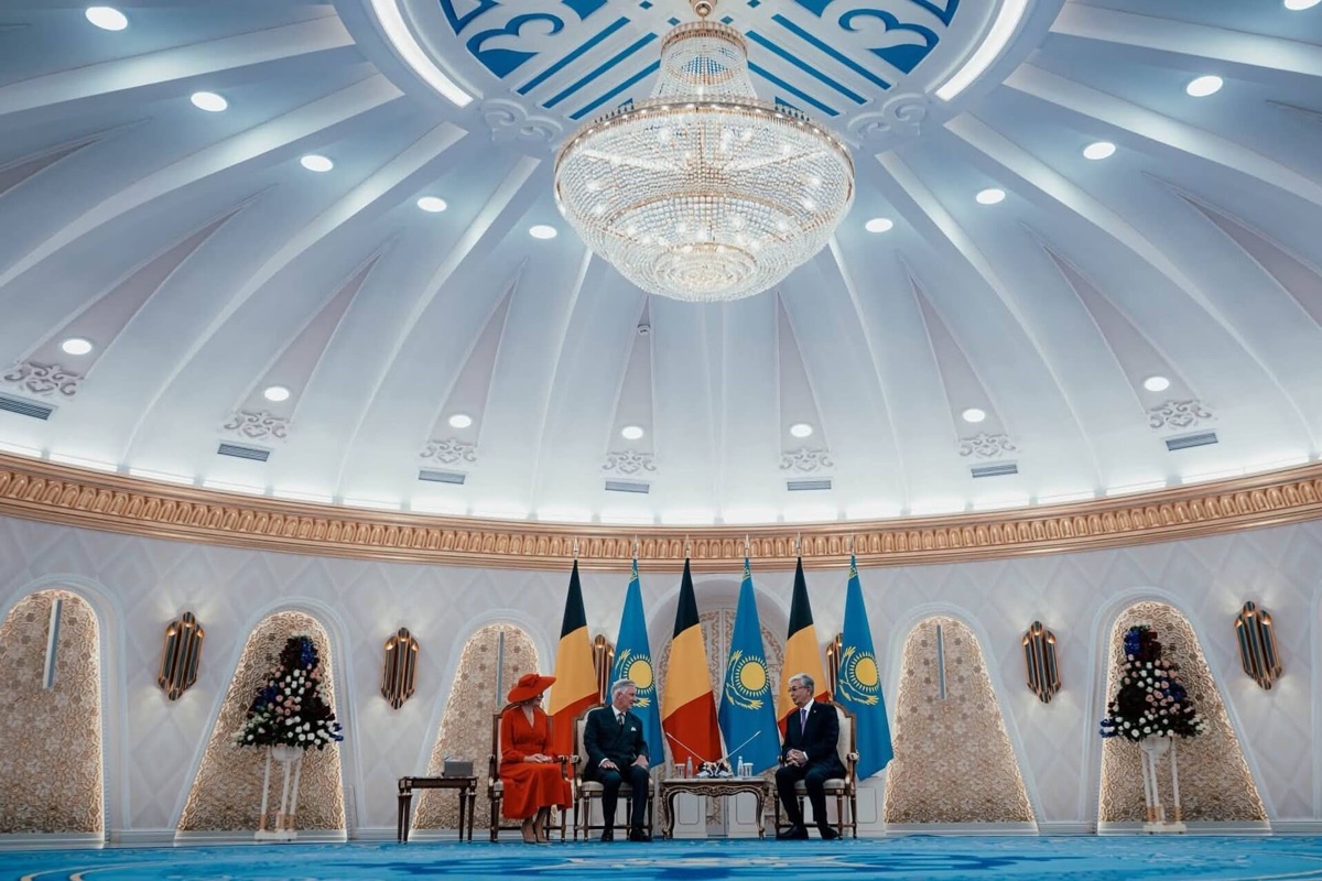 King Philippe, Queen Mathilde and President Tokayev in conversation beneath the great dome of the Akorda Palace