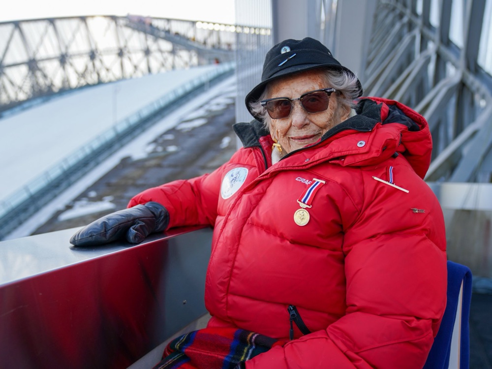 Princess Astrid sits in the stands at Holmenkollen