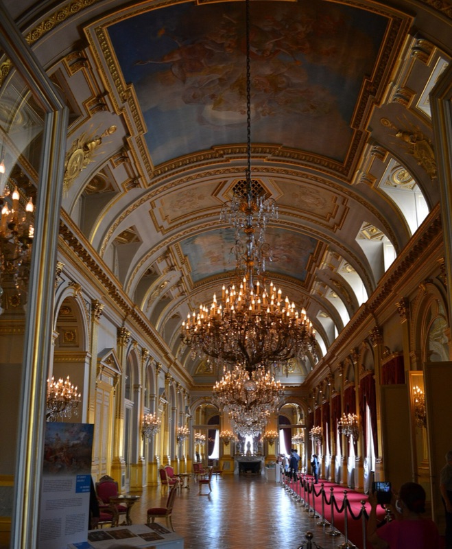 The Large Gallery with its vaulted painted ceiling and row of crystal chandeliers