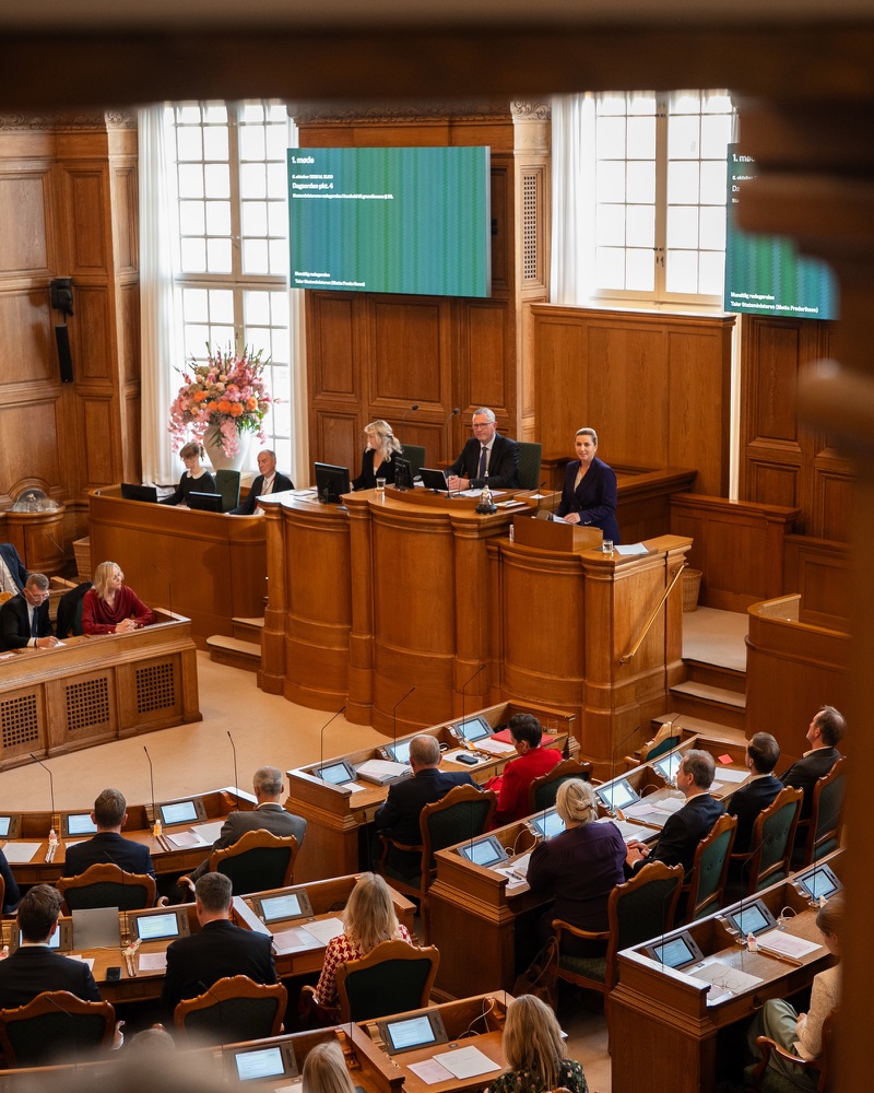 Prime Minister Mette Frederiksen delivers the opening address from the rostrum in the chamber